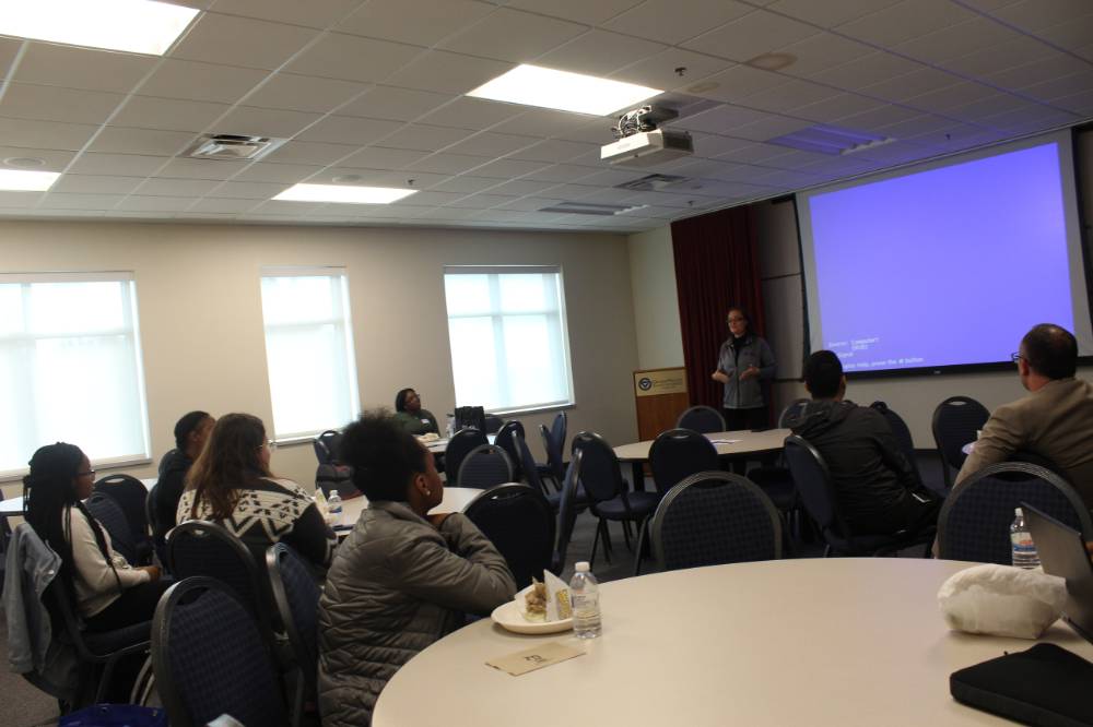 Students and faculty learning about opportunities for students to study abroad